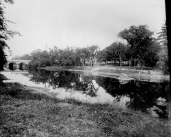 Needham St. - Highland Ave. bridge over the Charles near the old pumping station. The Saco Lowell 
shops are in the background. View from the Needham looking downstream.
